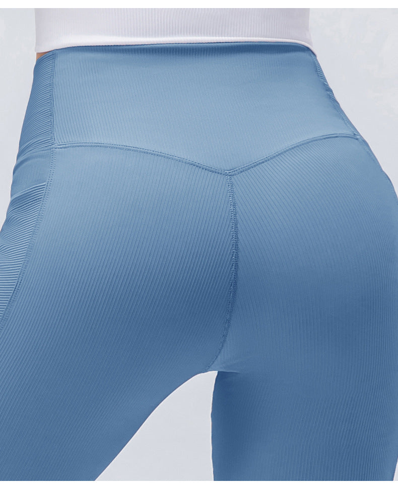 Pantalones cortos de ciclista con cintura cruzada y canalé para mujer de IUGA con bolsillos